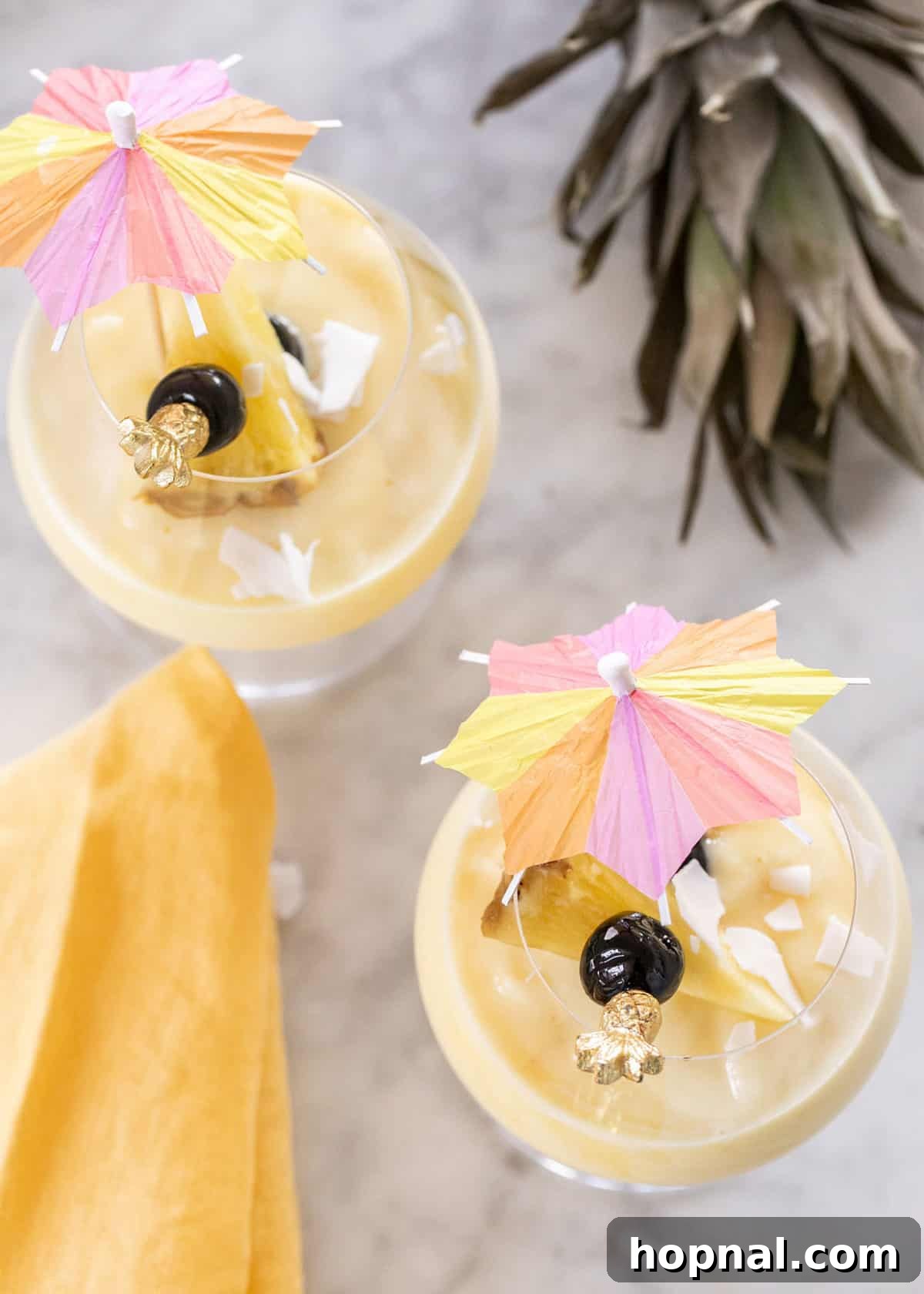 Frozen Piña Colada cocktail in a tall glass.