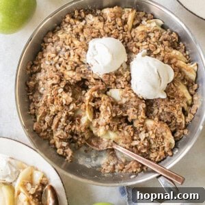 Easy apple crisp recipe, beautifully baked and ready to serve.