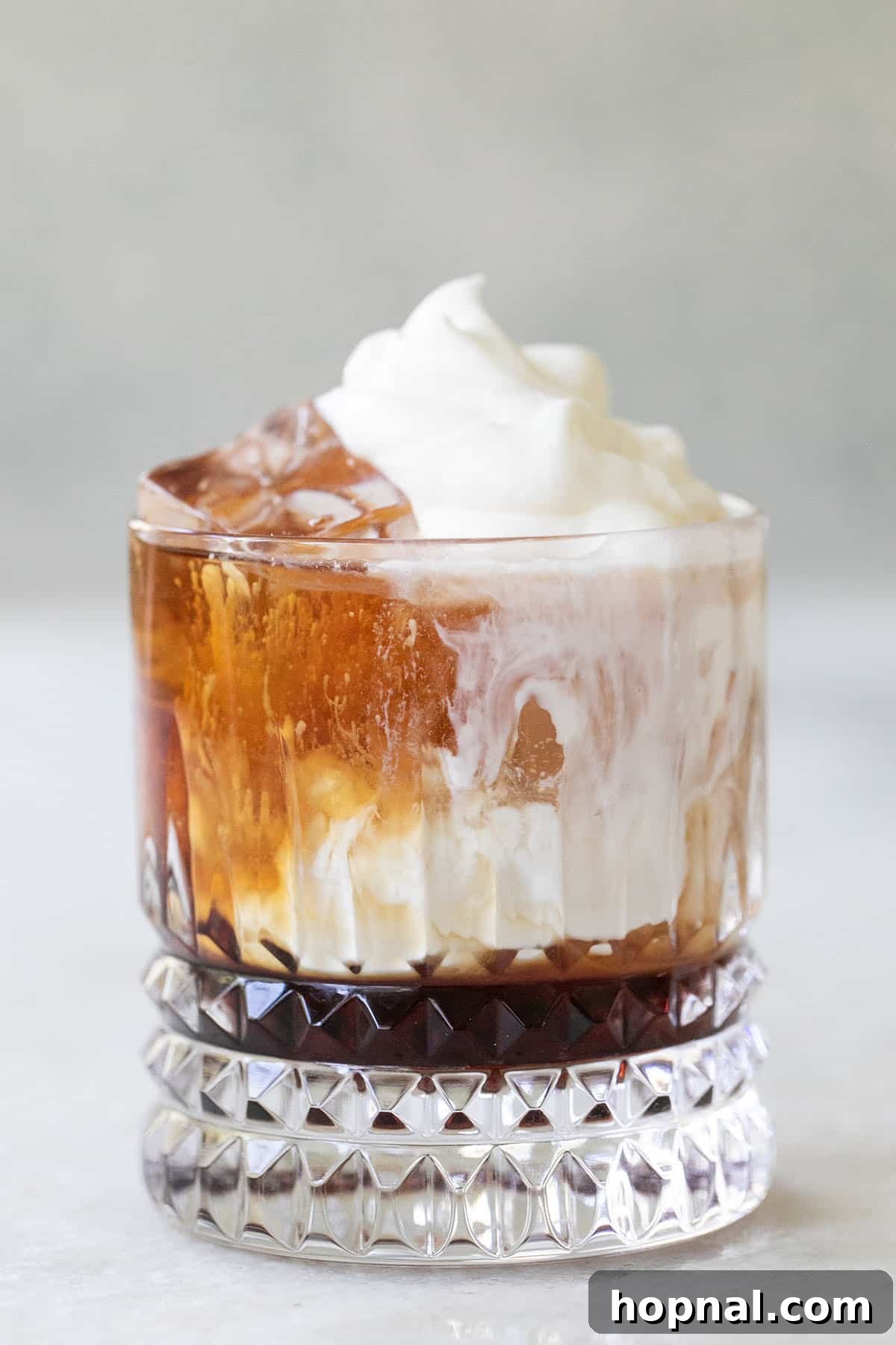 Cloud White Russian 2 A perfectly crafted White Russian cocktail with a creamy top layer