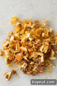 Sliced dried orange peel, ready for inclusion in the mulling spice mixture.