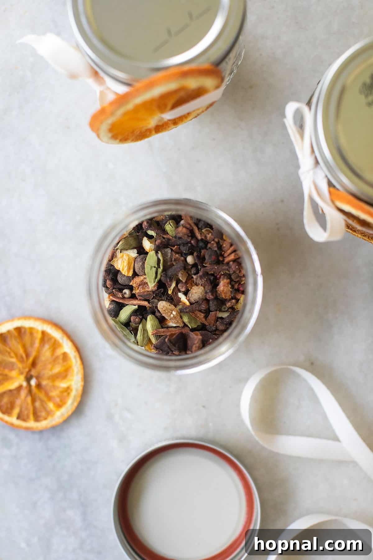 Mulled wine spices in a jar, ready for use in apple cider or wine.