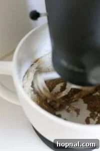 Melt-in-Your-Mouth Spritz Cookies 13 beating butter and sugar in a mixer to make spritz cookies