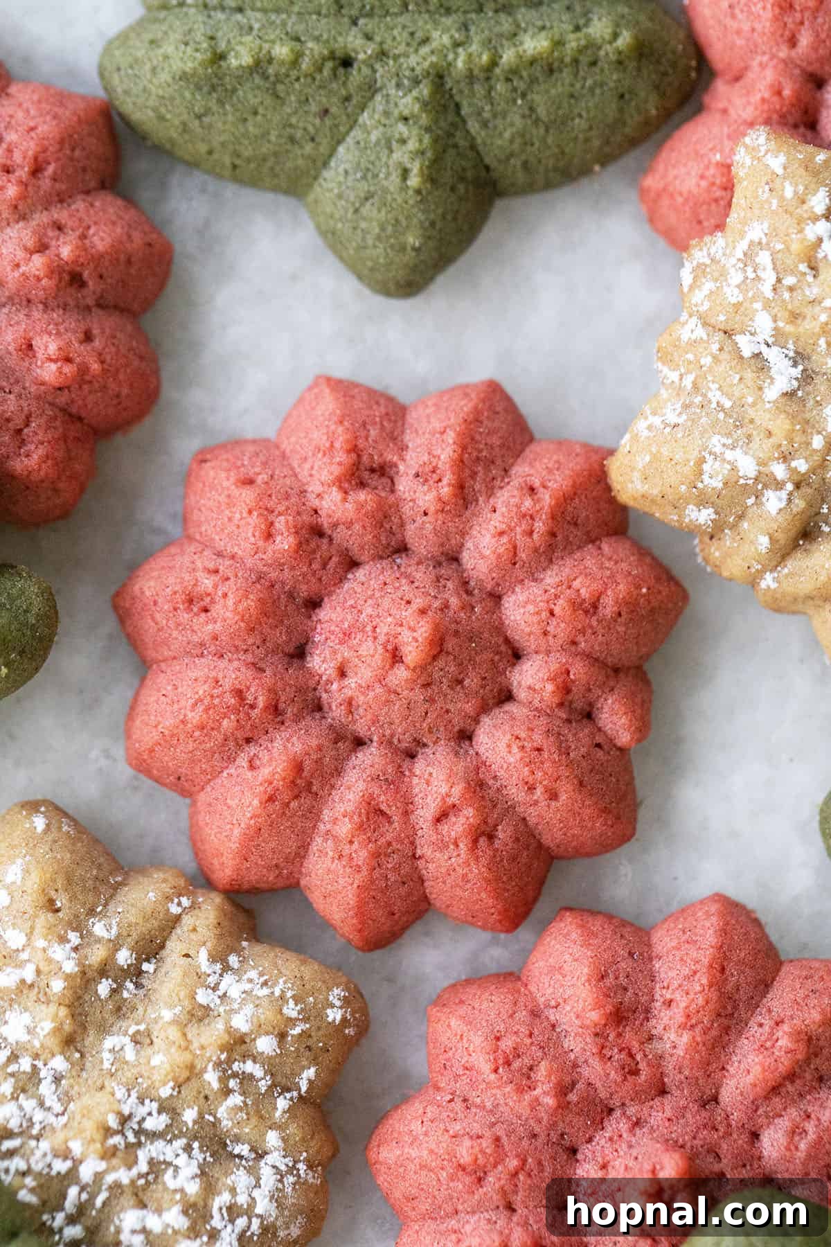 Melt-in-Your-Mouth Spritz Cookies 10 Classic red spritz cookies arranged beautifully.