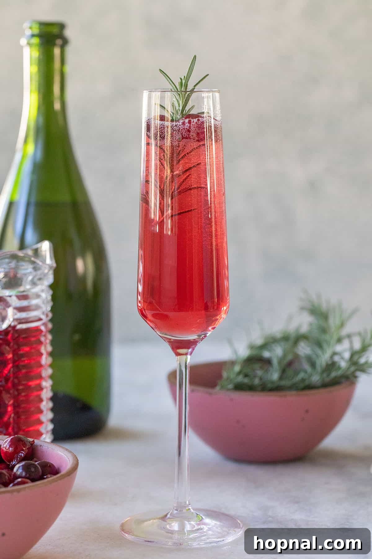Christmas Champagne Cocktail - chilled champagne flute with cranberry juice.