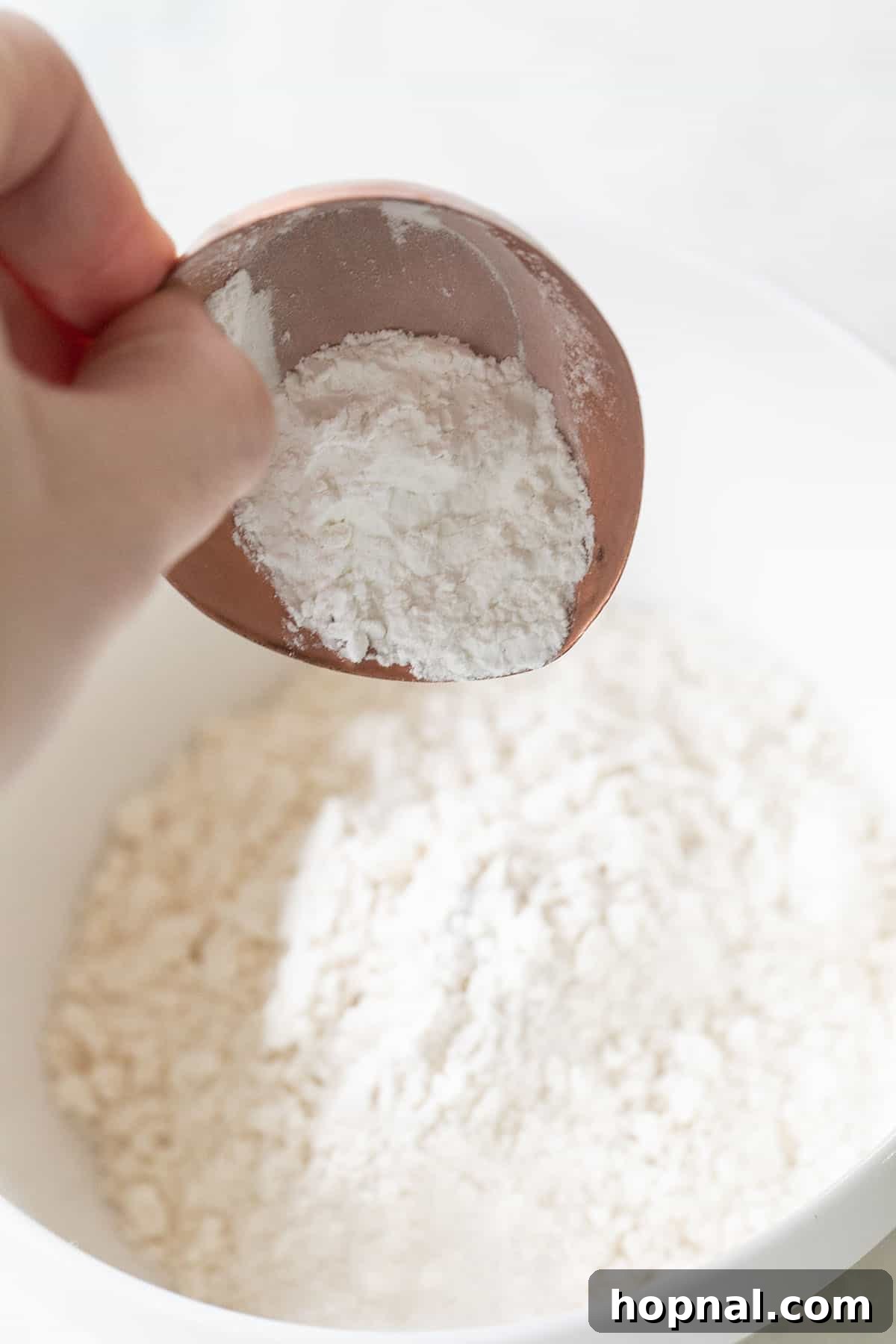 adding baking powder to all-purpose flour