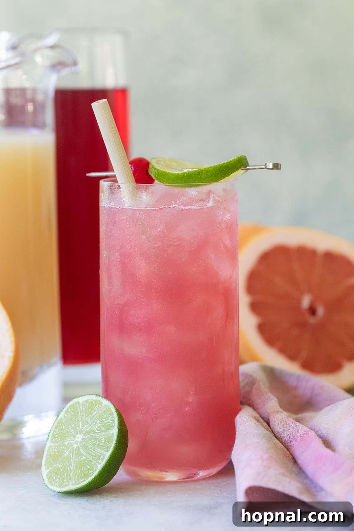 Blush & Sip 14 Easy sea breeze cocktail recipe with lime and cherry.