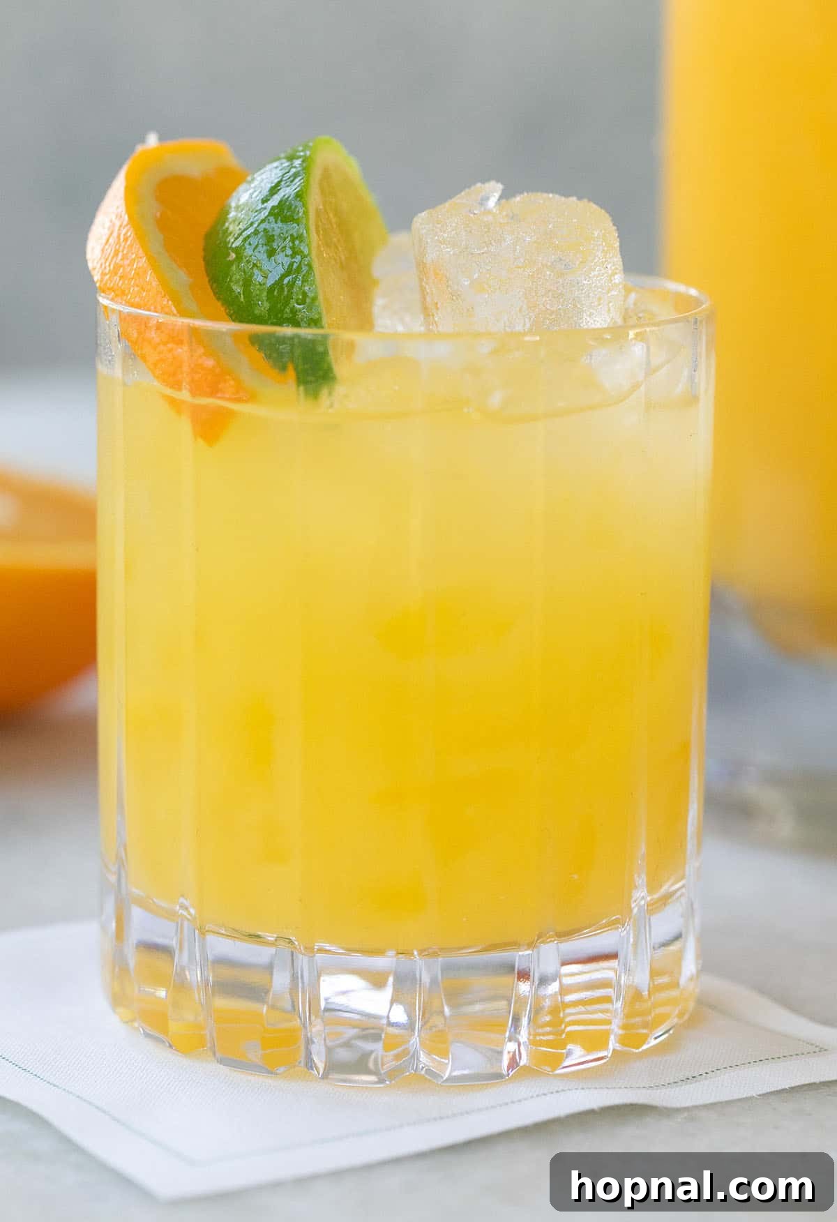 A refreshing Tequila and Orange Juice cocktail served in a highball glass with ice, ready to be enjoyed.