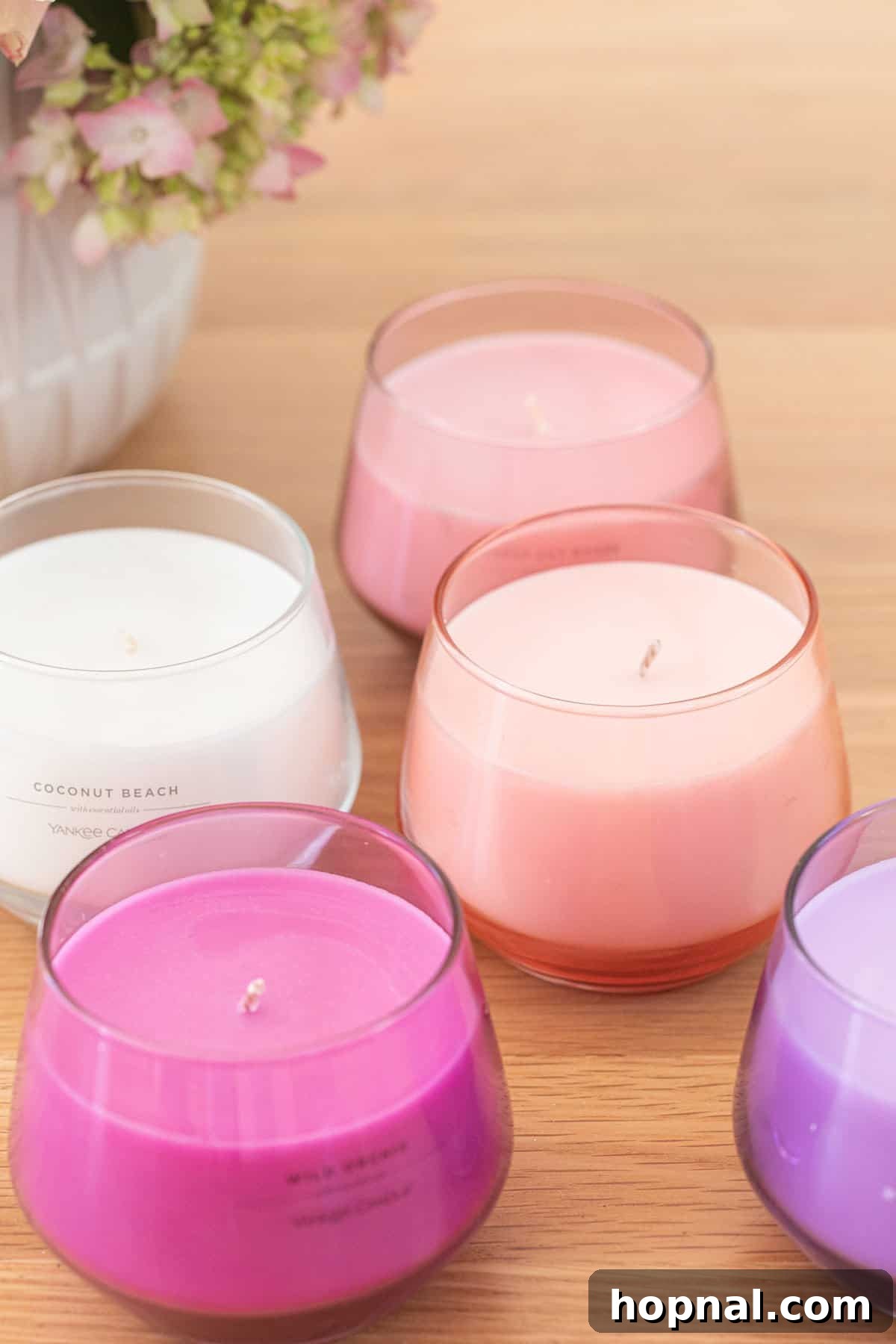 The Art of Spring Bar Styling 7 Yankee Candle Studio Collection candles in various colors on a bar cart