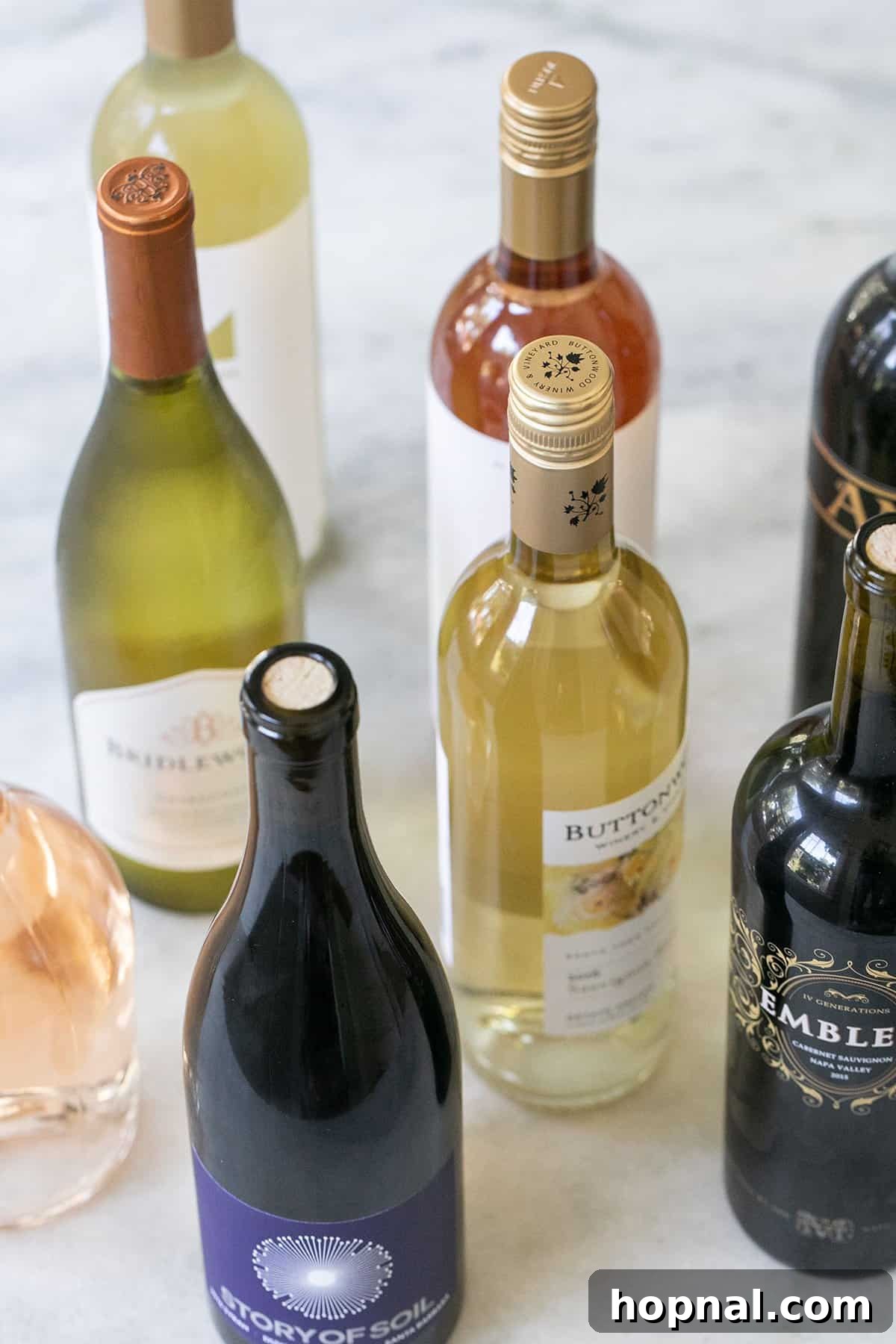 different types of wine bottles on a table