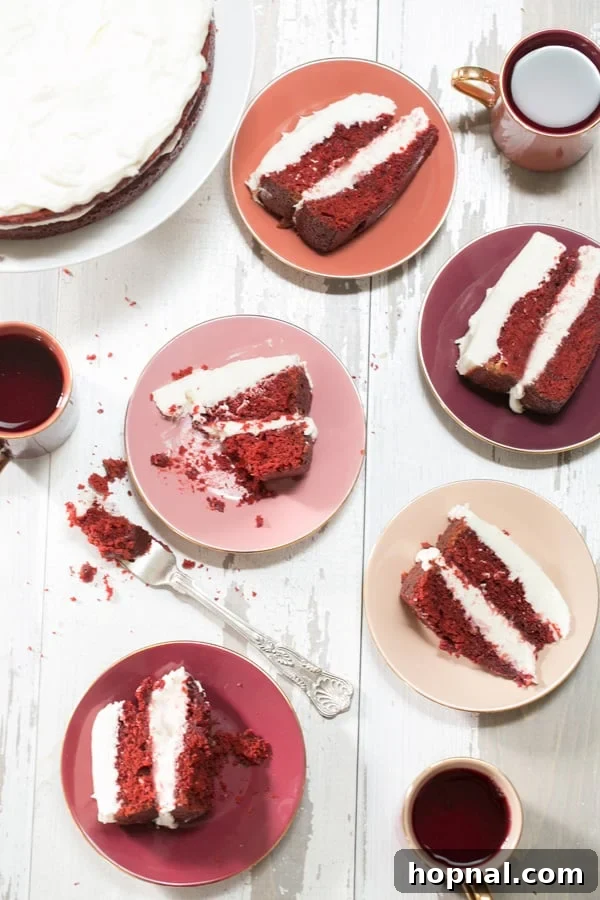 Effortless Red Velvet Cake Recipe 2 Top down shot of slices of easy red velvet cake with cream cheese frosting, ready to be served