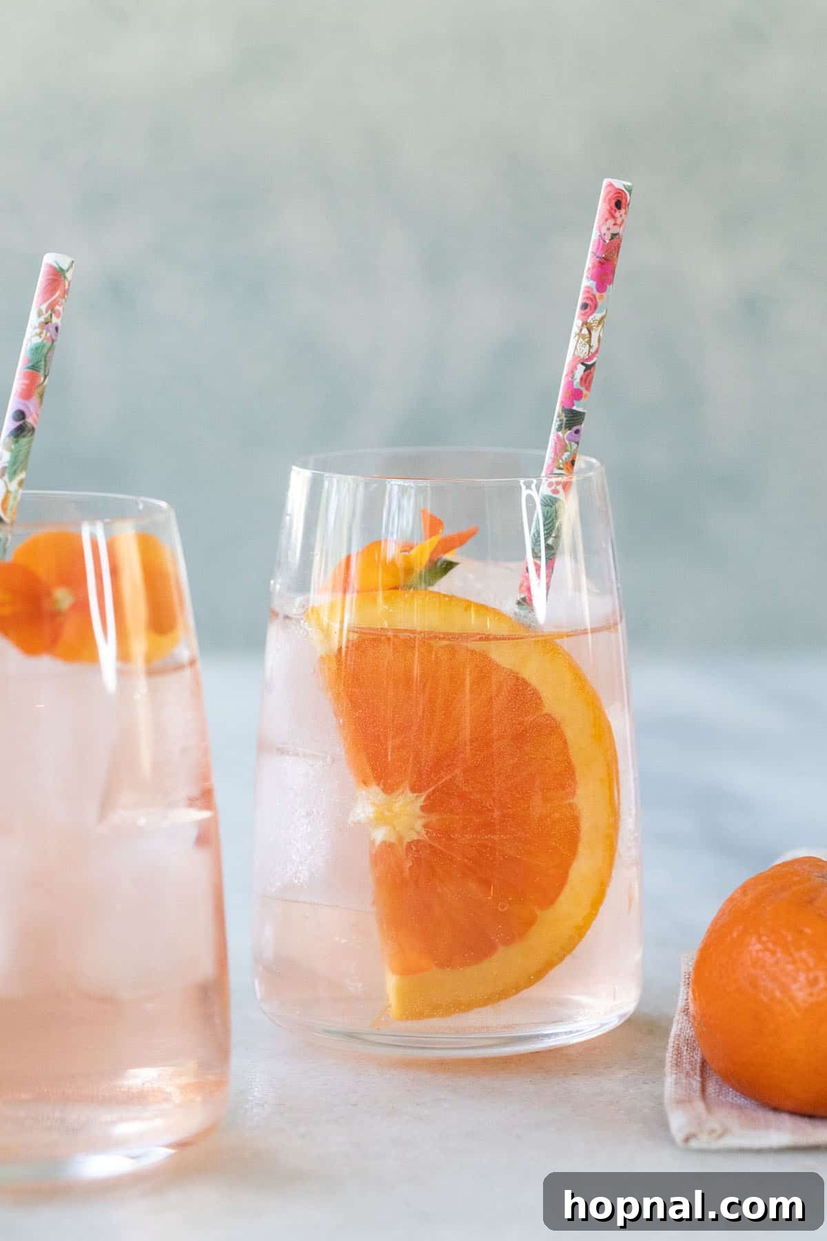 Effortless Rosé Refresher 5 A beautifully chilled rosé spritzer in a classic stemmed wine glass, ready to be enjoyed.