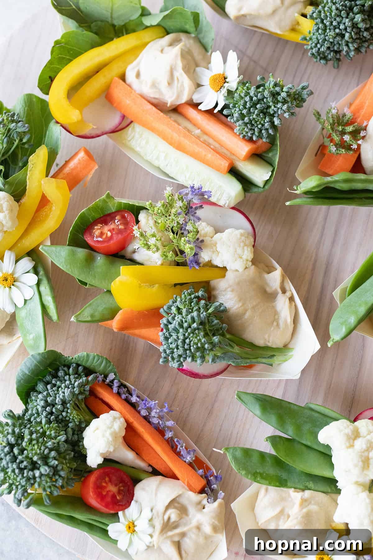60 Quick and Easy Party Appetizer Recipes 7 Party appetizer with fresh vegetables served with homemade hummus.