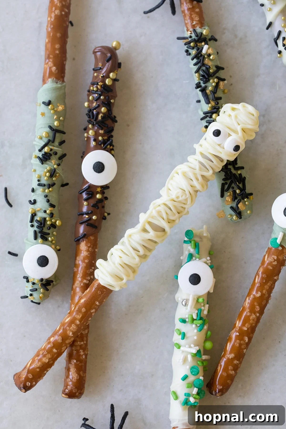 Monsters and mummy chocolate covered pretzel rods.