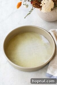 Melted sugar, butter and water poured into a round cake tin.