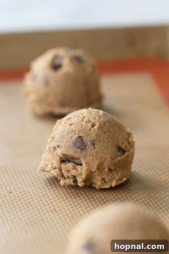 Close-up of freshly mixed espresso chocolate chip cookie dough ready for chilling.