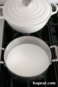 Heating milk on the stovetop.