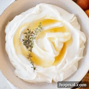 Creamy whipped ricotta with honey drizzled over the top,