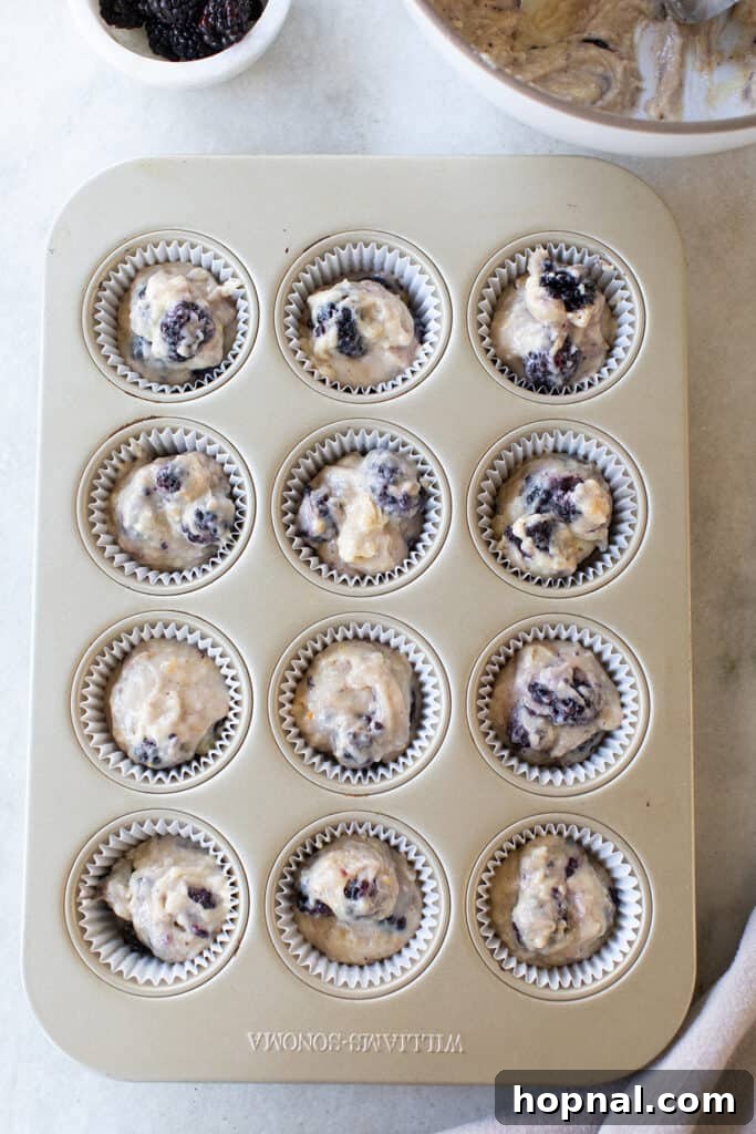 Batter inside muffin tin.