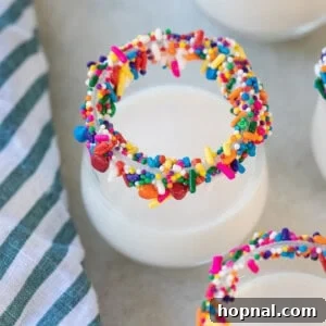 A festive Birthday Cake Shot with a sprinkle rim.