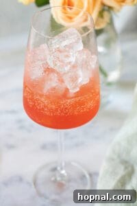 How to make a strawberry Aperol Spritz.