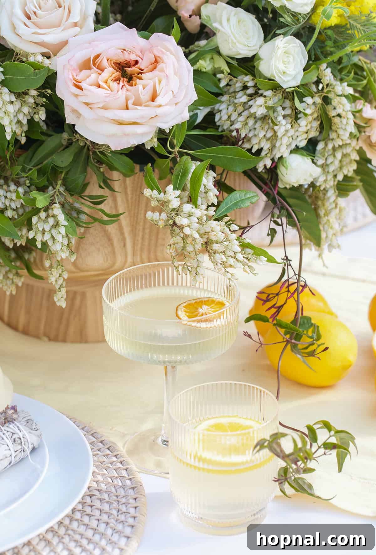 Spring Gatherings: A Lemon-Kissed Table 12 A refreshing display of lemon cocktails and lemon-infused water, inviting guests to enjoy a cool drink.