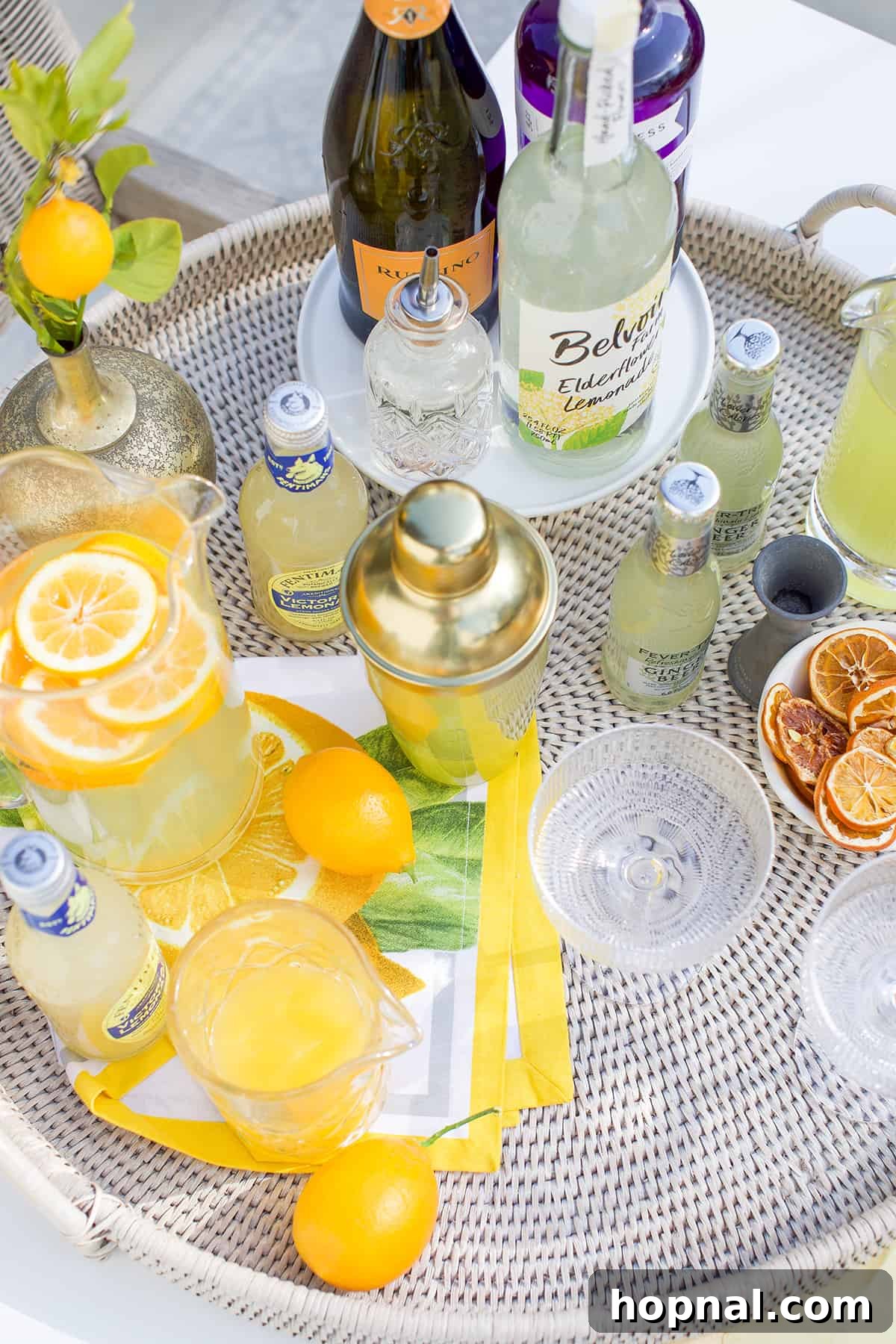 Spring Gatherings: A Lemon-Kissed Table 15 A vibrant lemon cocktail station, complete with fresh lemons, drinks, and stylish glassware, perfect for a spring party.
