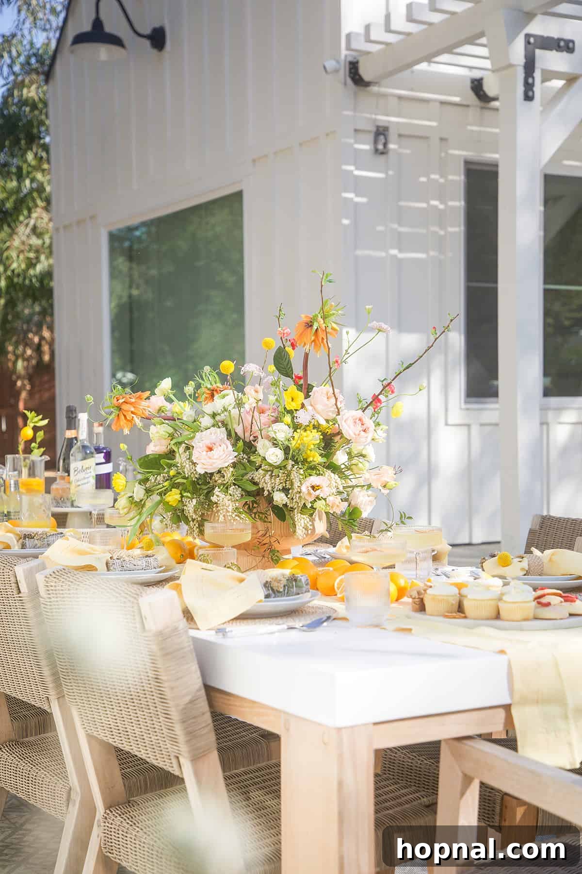 Spring Gatherings: A Lemon-Kissed Table 9 Overhead view of a beautifully curated lemon themed spring gathering and table setting, featuring exquisite details.