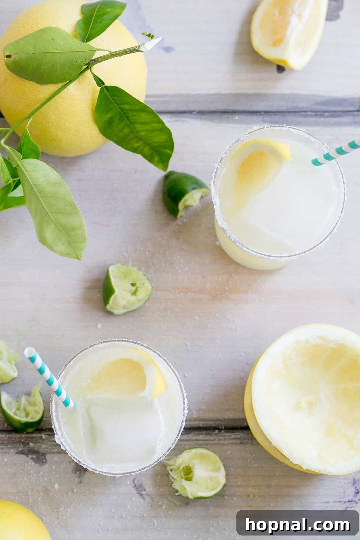 Close-up of a yellow grapefruit margarita with salted rim