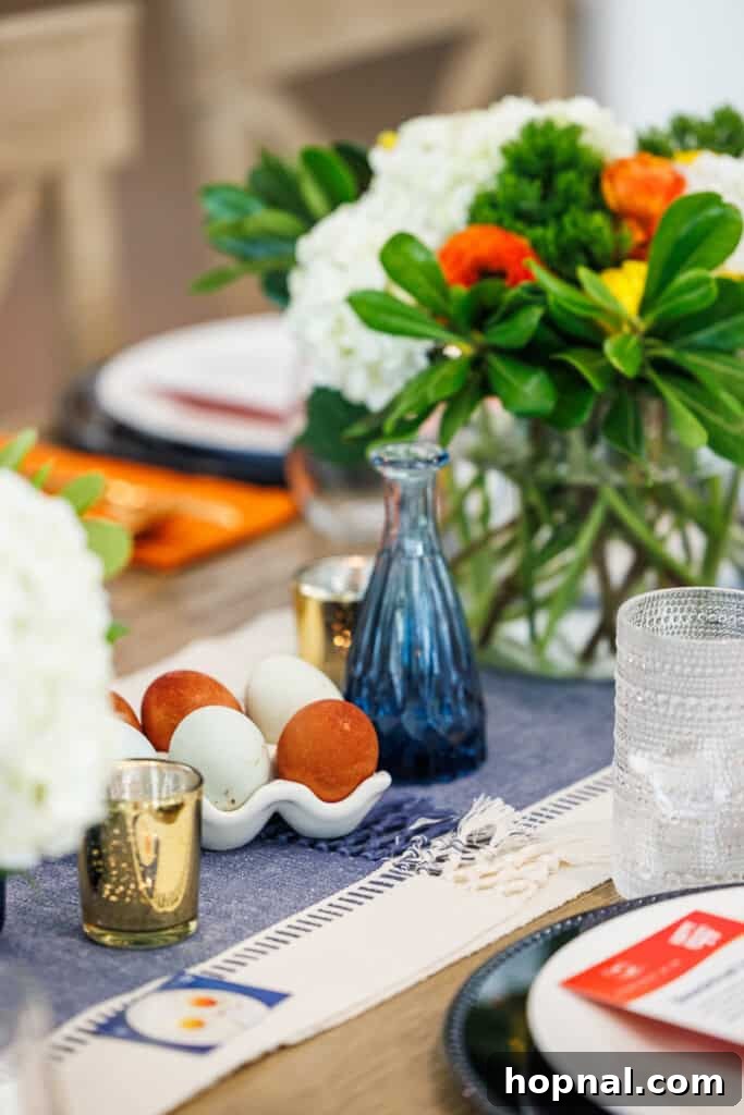 Elegantly set brunch table with fresh flowers and delectable dishes