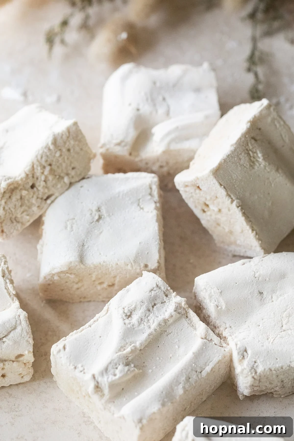 Pillowy Maple Dreams 8 Fluffy maple syrup marshmallows in a bowl, ready to be served.