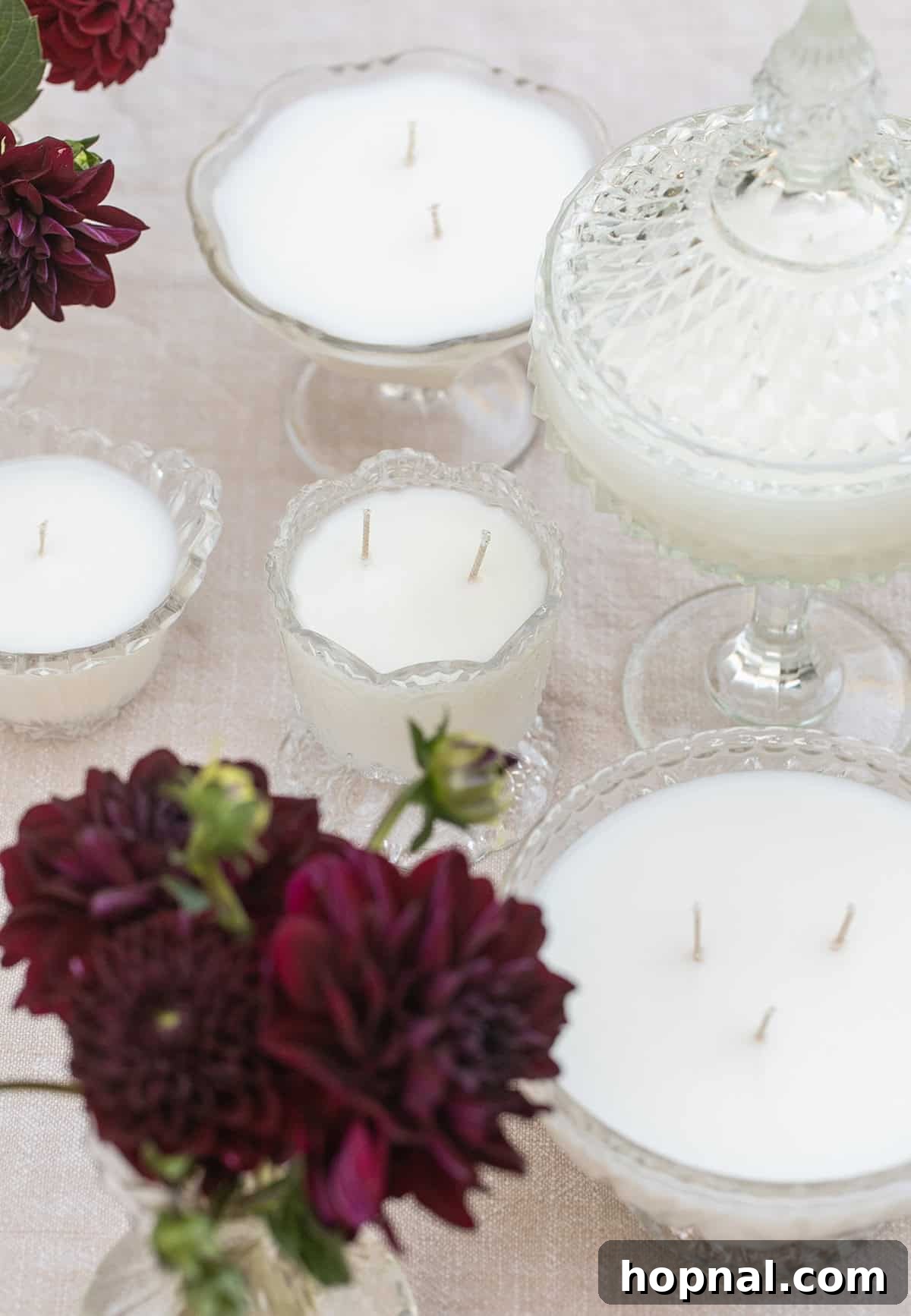 Freshly poured vintage glassware candles setting on a counter