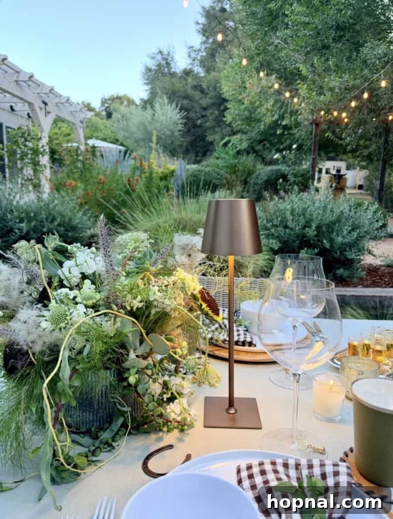 Rodeo-Themed Dinner Party Ideas: Menu, Decor & Tips 18 Rodeo dinner party, glowing lantern and flowers on a table setting.
