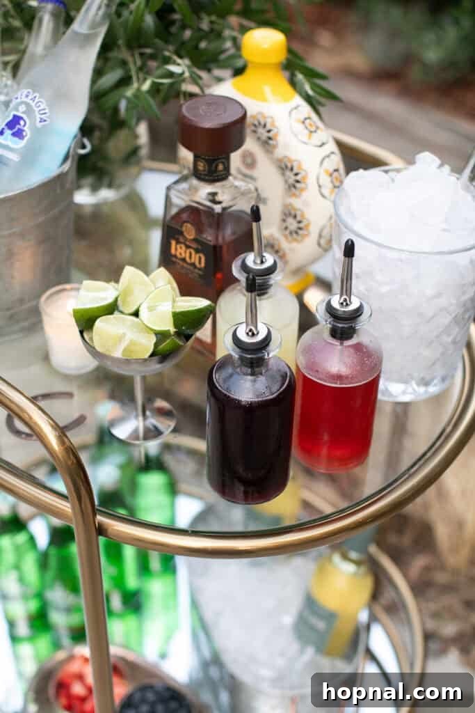 Rodeo-Themed Dinner Party Ideas: Menu, Decor & Tips 10 Homemade syrups on a bar cart with limes and tequila to make your own ranch water.